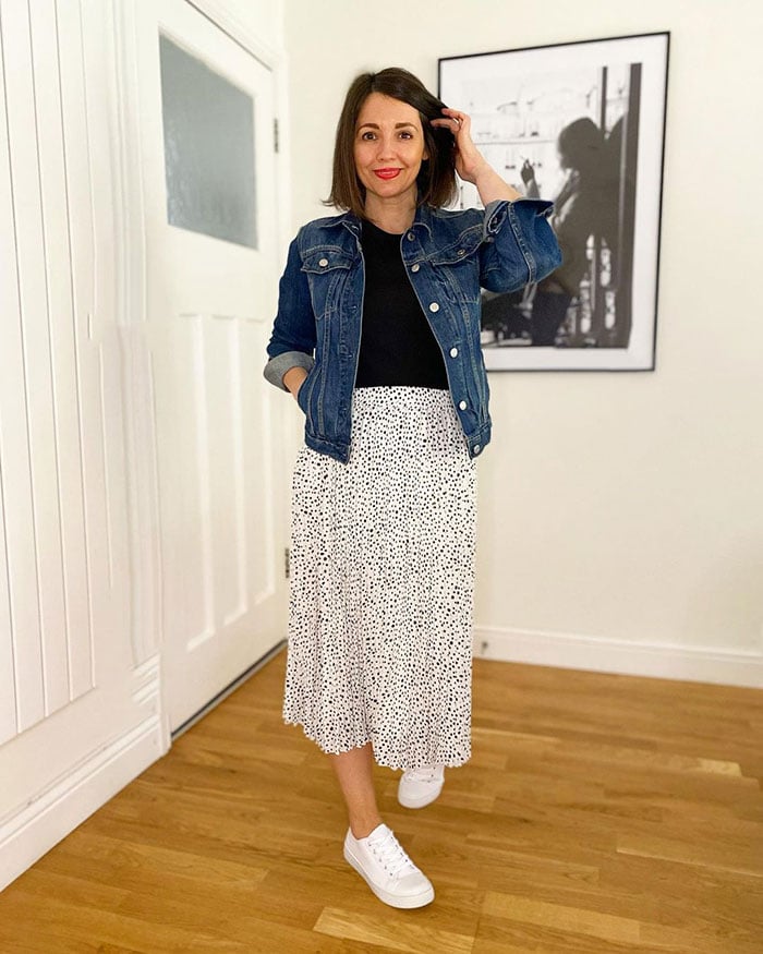 Nikki in a midi skirt and denim jacket | 40plusstyle.com