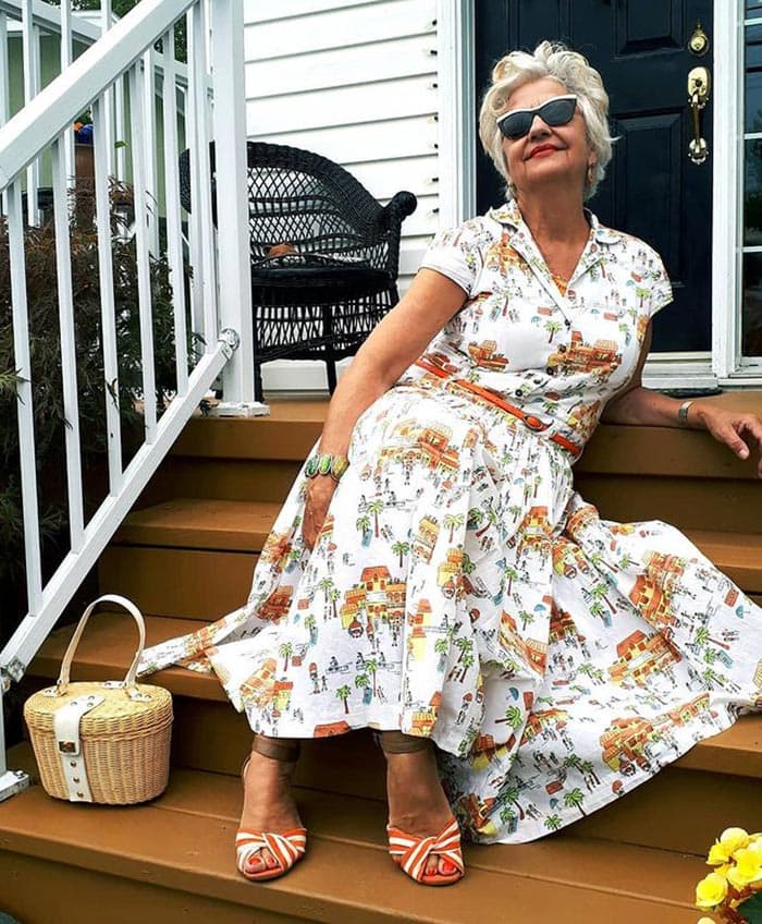 Terri in a print dress and sandals | 40plusstyle.com