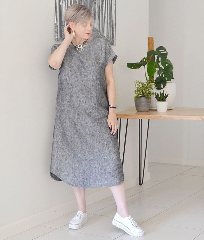 Deborah wears a gray dress | 40plusstyle.com