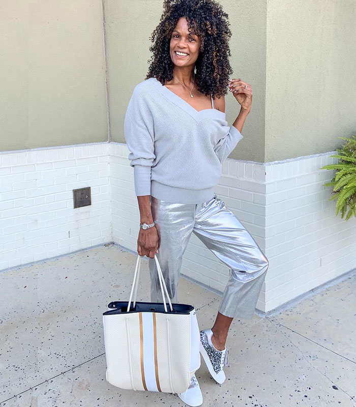 Combining a Prada basket bag with an all-white outfit