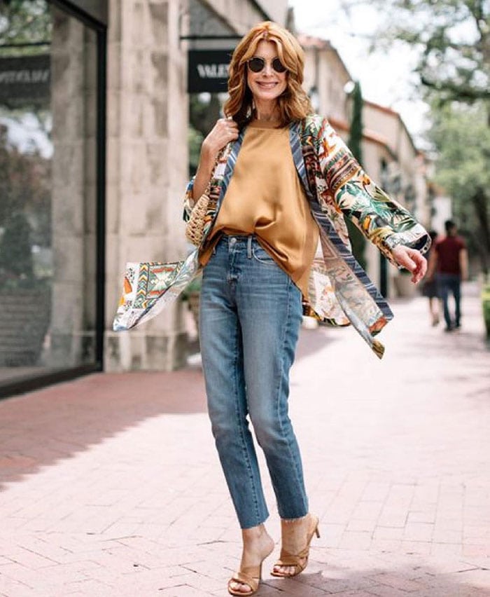 What to wear to a bar - Cathy in jeans and a silk top | 40plusstyle.com