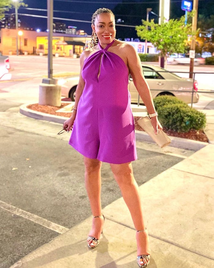 Vegas outfits - Erica in a purple romper and heels | 40plusstyle.com