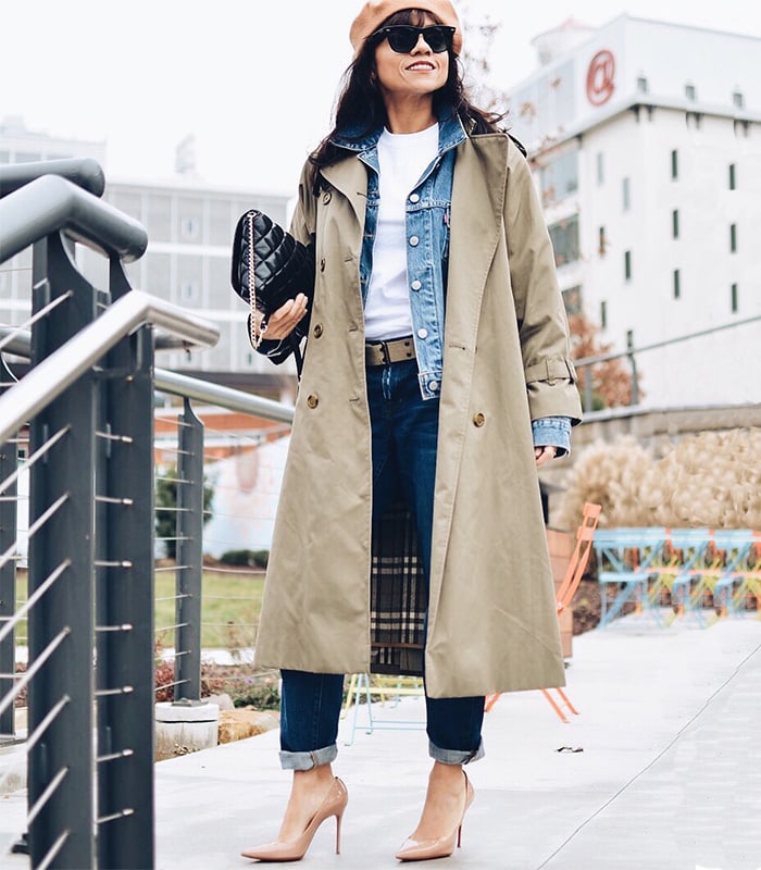 Carelia wears her trench coat over a denim jacket | 40plusstyle.com