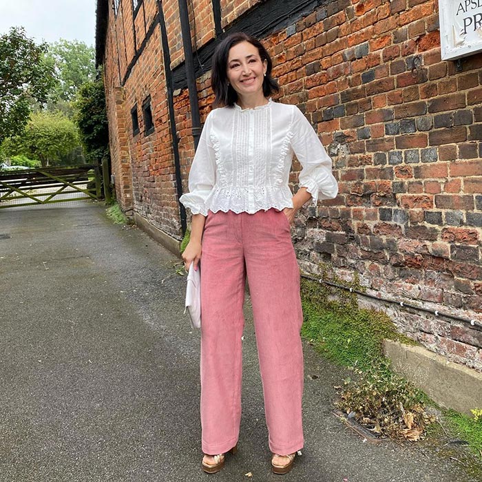 Casual party outfits - Emms in corduroy pants and a lace blouse | 40plusstyle.com