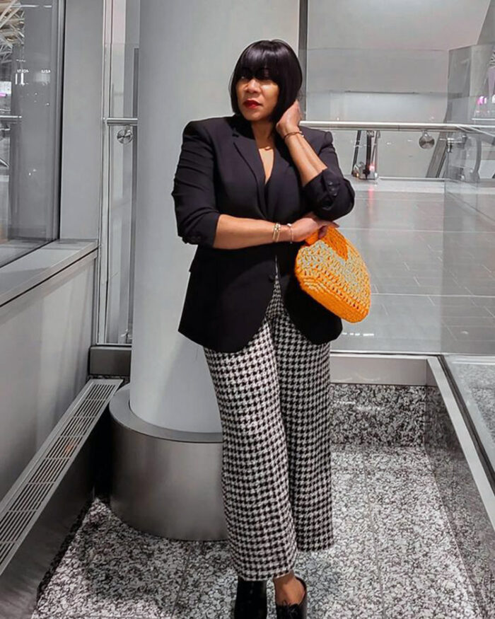Boma wears check pants and a blazer | 40plusstyle.com