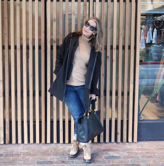 What to wear to the airport - Dawn Lucy in a warm jacket and boots | 40plusstyle.com