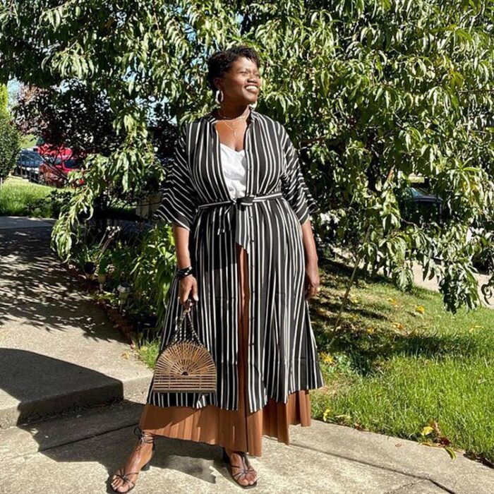 Georgette styling a shirtdress with pleated skirt | 40plusstyle.com