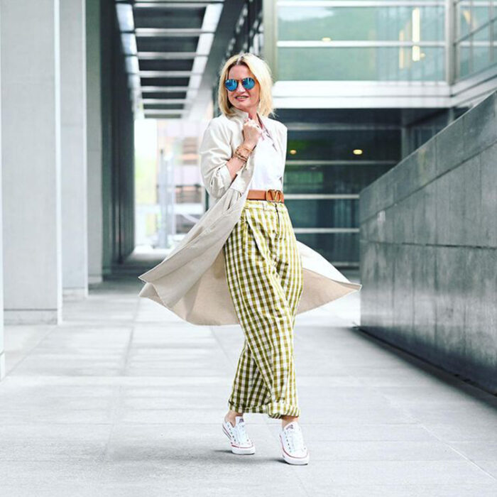 Yvonne wears check pants and sneakers | 40plusstyle.com