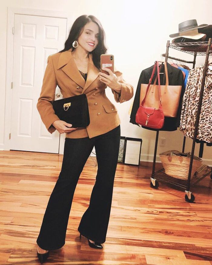 Carela wears flare jeans with her blazer | 40plusstyle.com