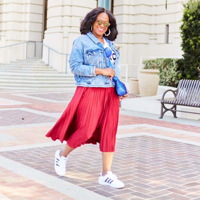 How to wear for Easter - casual wear: denim jacket, pleated skirt and sneakers | 40plusstyle.com