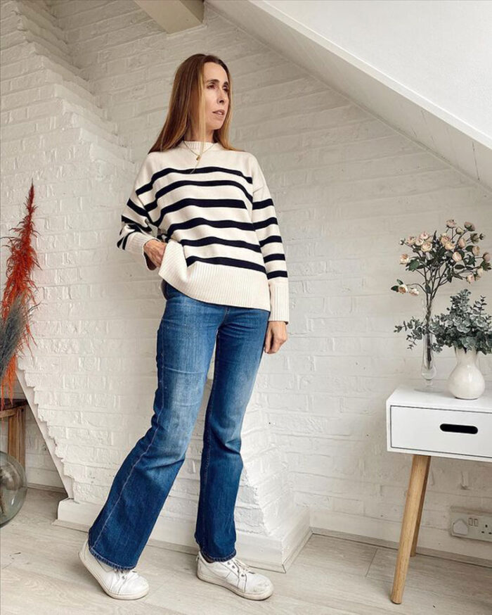 Marie-Louise in sweater, bootcut jeans and sneakers | 40plusstyle.com