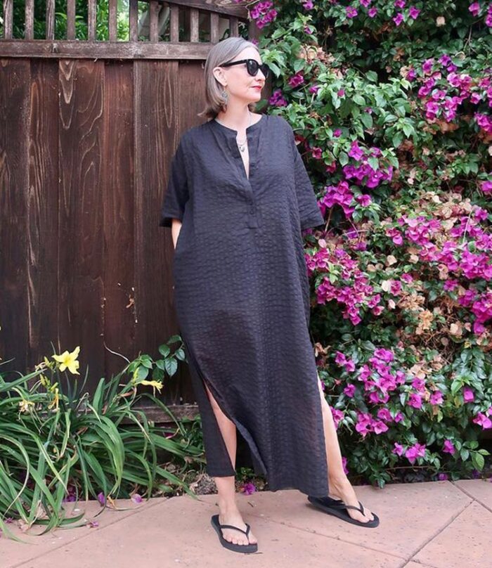 Beach cover ups - Dawn Lucy in a long black cover up | 40plusstyle.com