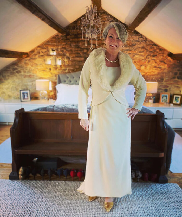 How to dress when you are mother of the bride - Nikki chooses a fur cover up | 40plusstyle.com