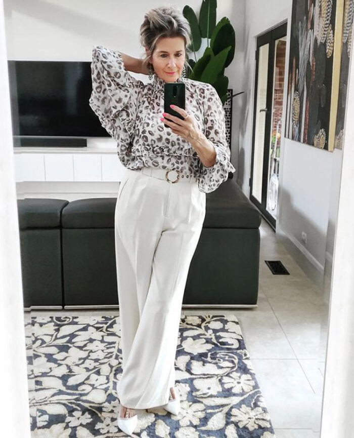 What to wear to a casual wedding - Suzie in a blouse and wide leg pants | 40plusstyle.com