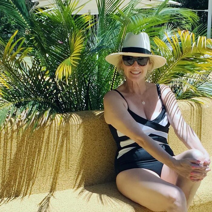 Suzie wears a monochrome one piece swimsuit | 40plusstyle.com