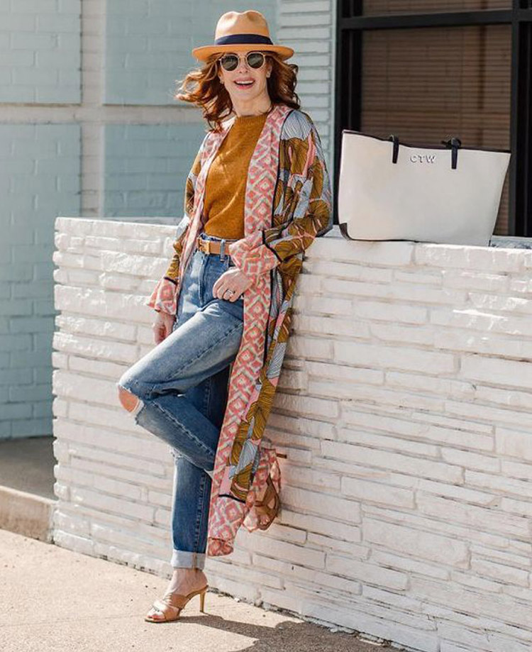 Cathy adds a colorful duster jacket over her jeans | 40plusstyle.com