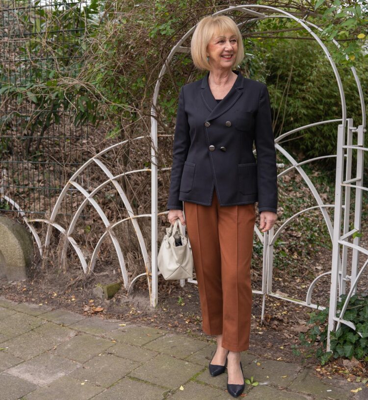 Greetje in a blazer and dress pants | 40plusstyle.com