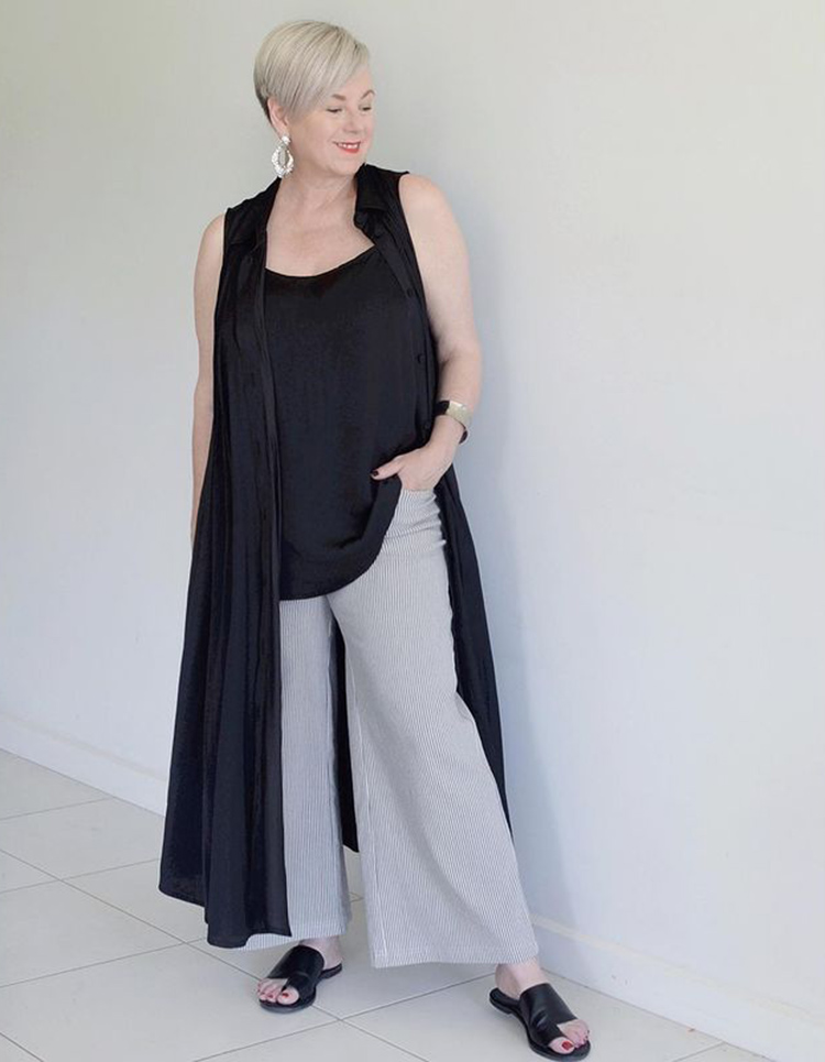 Deborah layers a long vest over her outfit | 40plusstyle.com