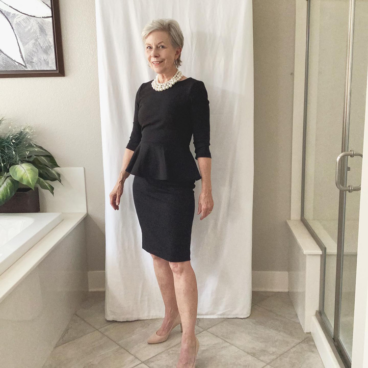 Classy business outfits for women - Eileen wears a peplum top and pencil skirt | 40plusstyle.com