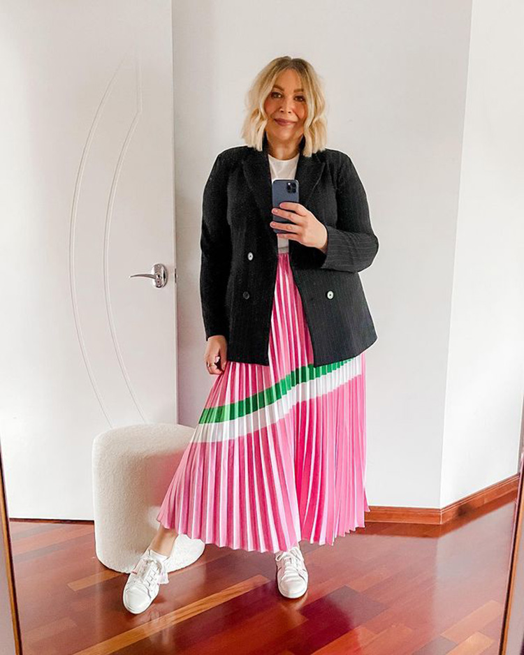 Sara in a blazer and pleated skirt | 40plusstyle.com
