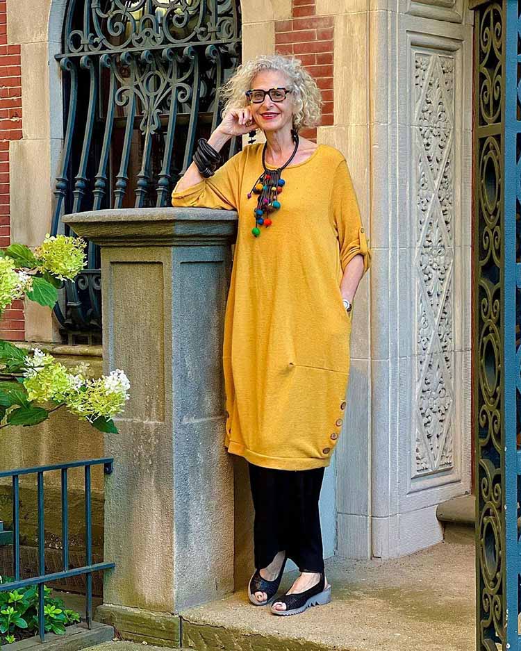 Dayle in a yellow dress and arch support shoes | 40plusstyle.com
