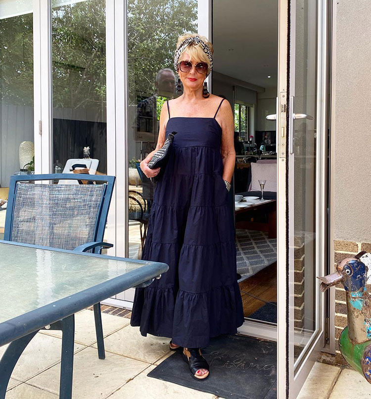 How to wear navy - Sharryn in a tiered navy dress | 40plusstyle.com
