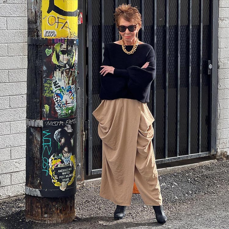 Sweater outfits - Dorrie wears her boat neck sweater with a maxi skirt | 40plusstyle.com