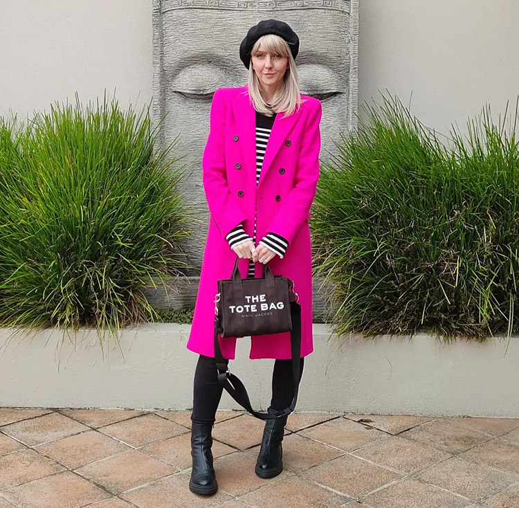 Winter outfits for women - Melissa wears a pink coat | 40plusstyle.com