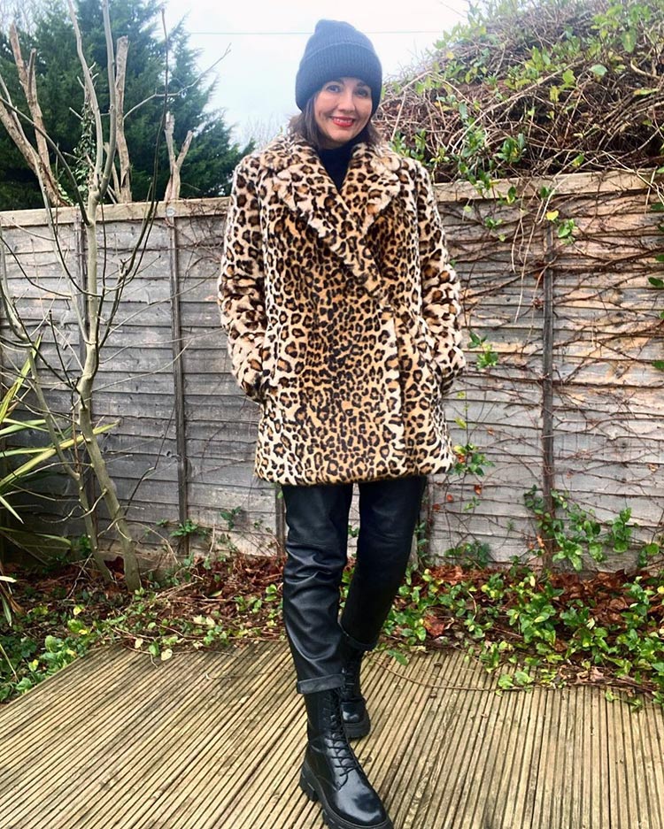 Winter outfits for women - Nikki wears a leopard print coat | 40plusstyle.com
