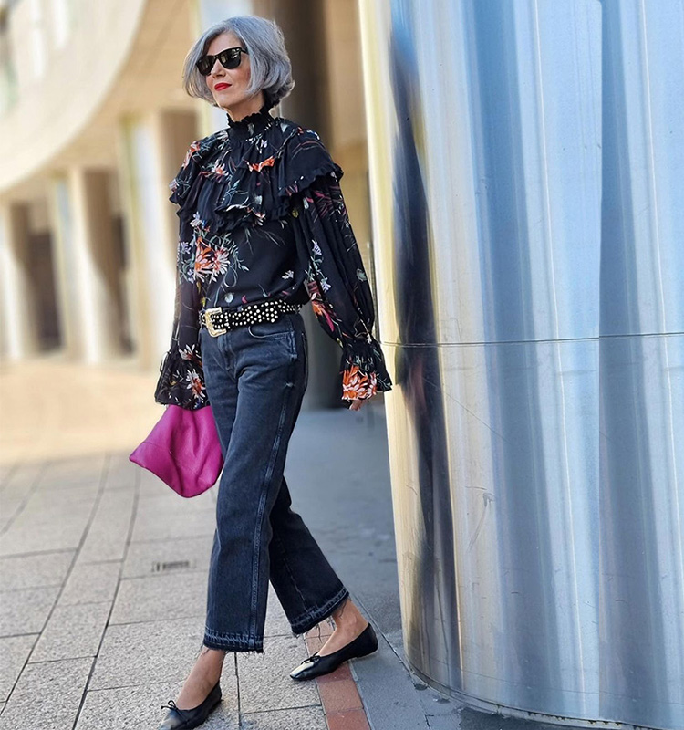 Carmen in a floral blouse, jeans and flats | 40plusstyle.com