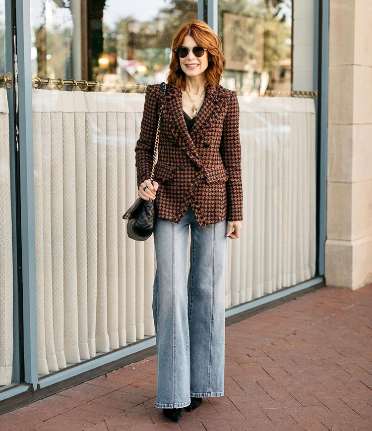 Office party outfit idea: Cathy wears a blazer and a pair of wide leg jeans | 40plusstyle.com