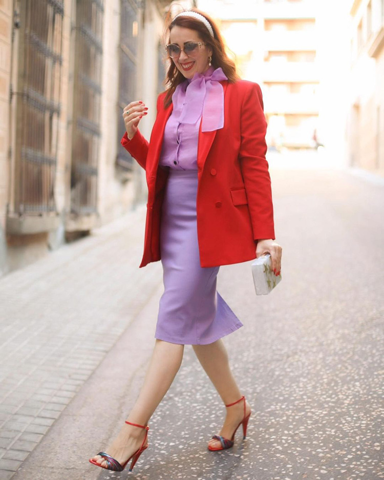 Patricia combines red and purple | 40plusstyle.com