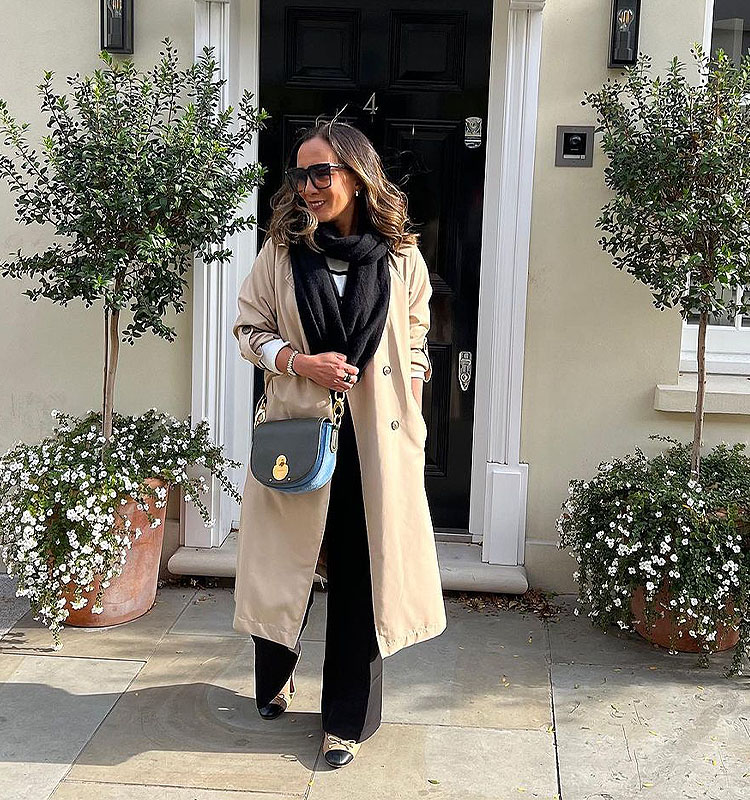 Wardrobe essentials - Abi wears a trench coat | 40plusstyle.com