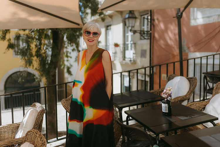 Sylvia in a colorful dress | 40plusstyle.com