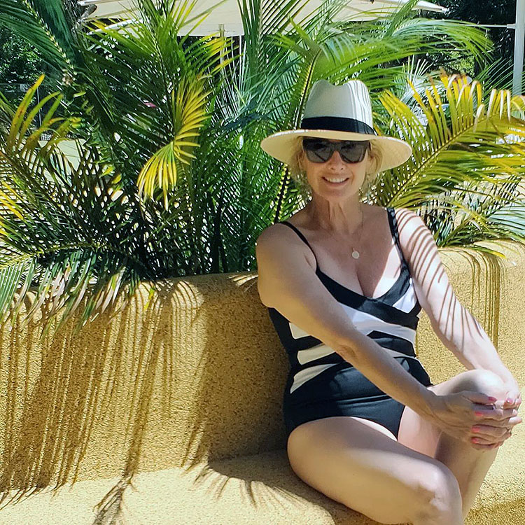 What to wear on a cruise - Suzie in a monochrome swimsuit | 40plusstyle.com