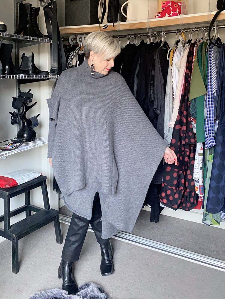 Deborah in oversize poncho, coated pants and boots | 40plusstyle.com