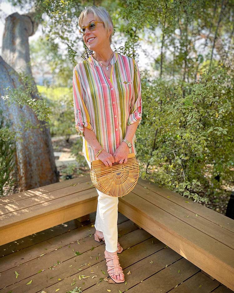 Susan in striped shirt, jeans and sandals | 40plusstyle.com