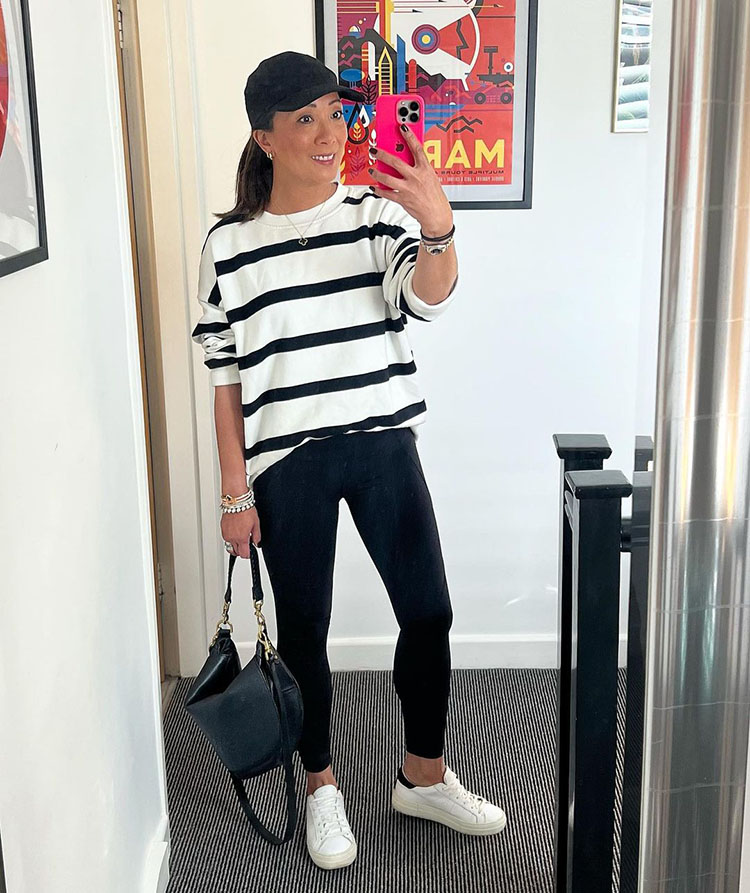 Abi in striped sweater, leggings and sneakers | 40plusstyle.com