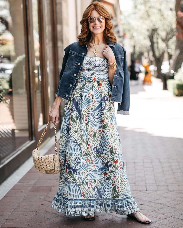 Womens jackets for summer - Cathy wears a denim jacket over her maxi dress | 40plusstyle.com