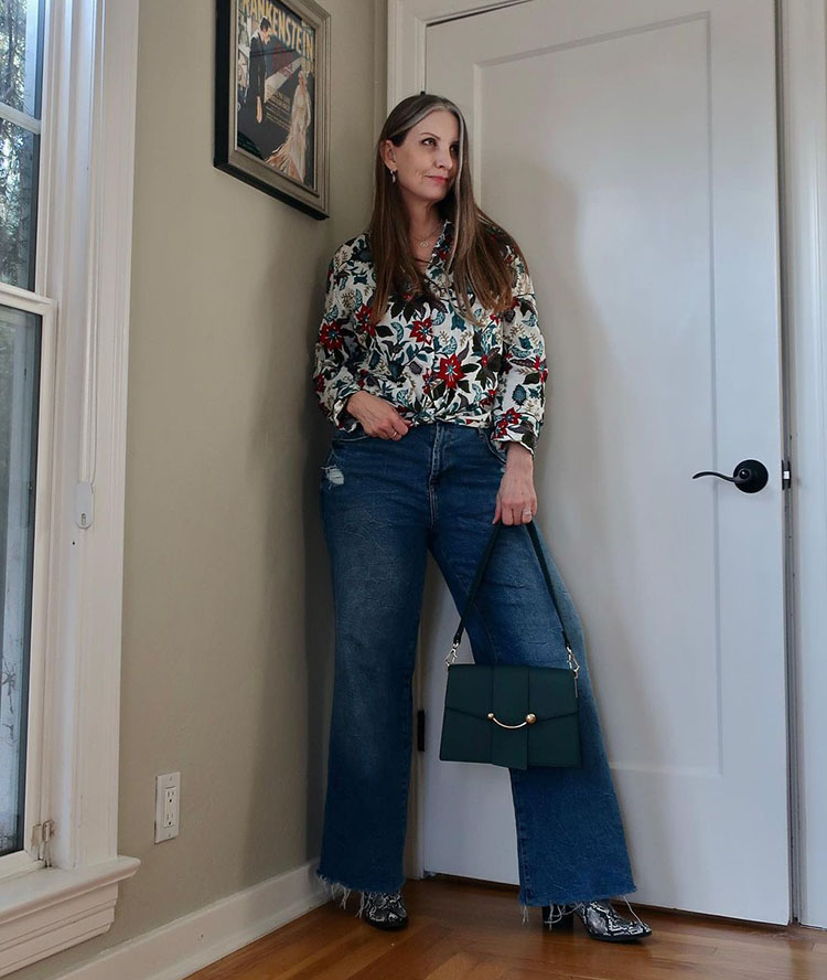 Dawn Lucy wears a floral shirt with her jeans | 40plusstyle.com
