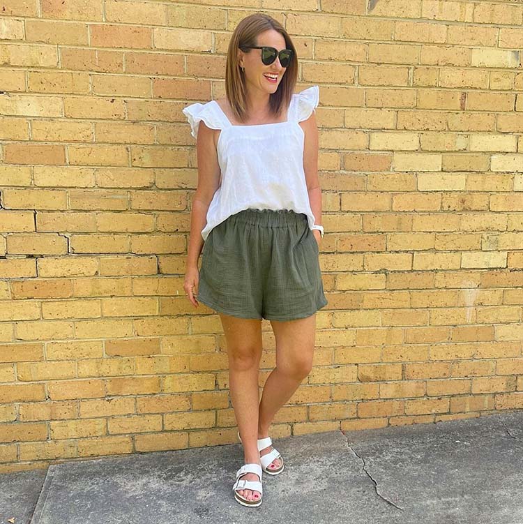 The best women's sandals this summer - Karen wears white sandals with her shorts | 40plusstyle.com