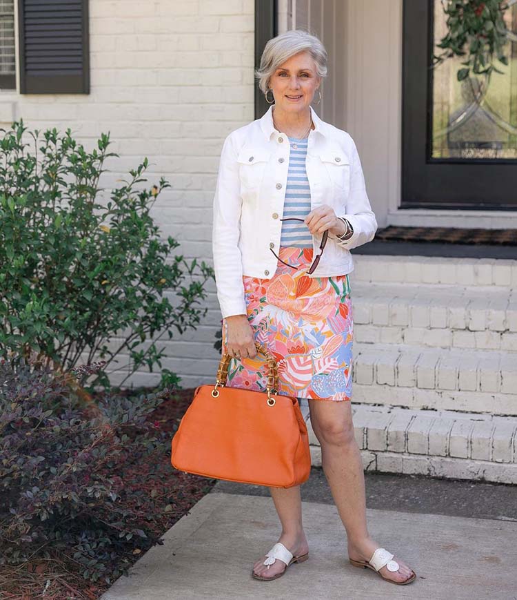Beth wears a white jacket with her print skirt | 40plusstyle.com