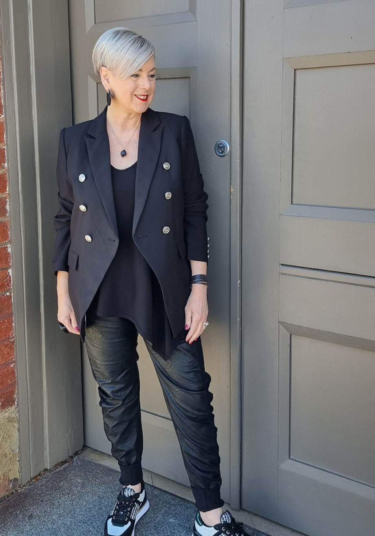 Deborah wears a blazer and leather look pants | 40plusstyle.com