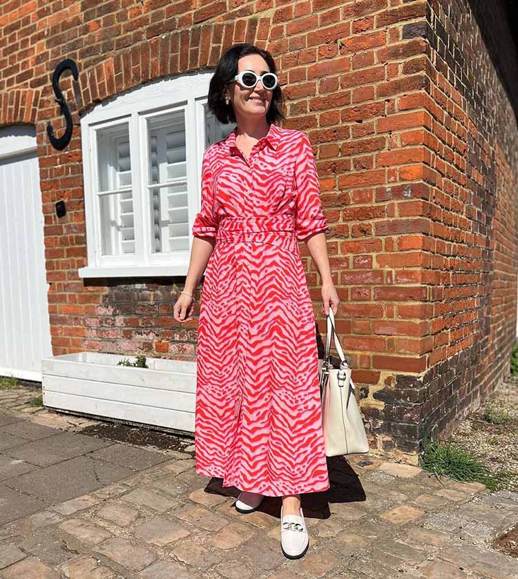 Summer dresses for women over 40 - Emms wears a maxi dress and loafers | 40plusstyle.com