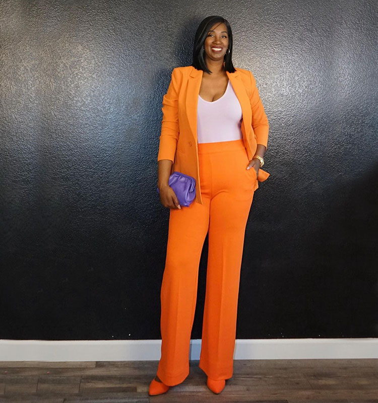 Tanasha wears an orange suit | 40plusstyle.com