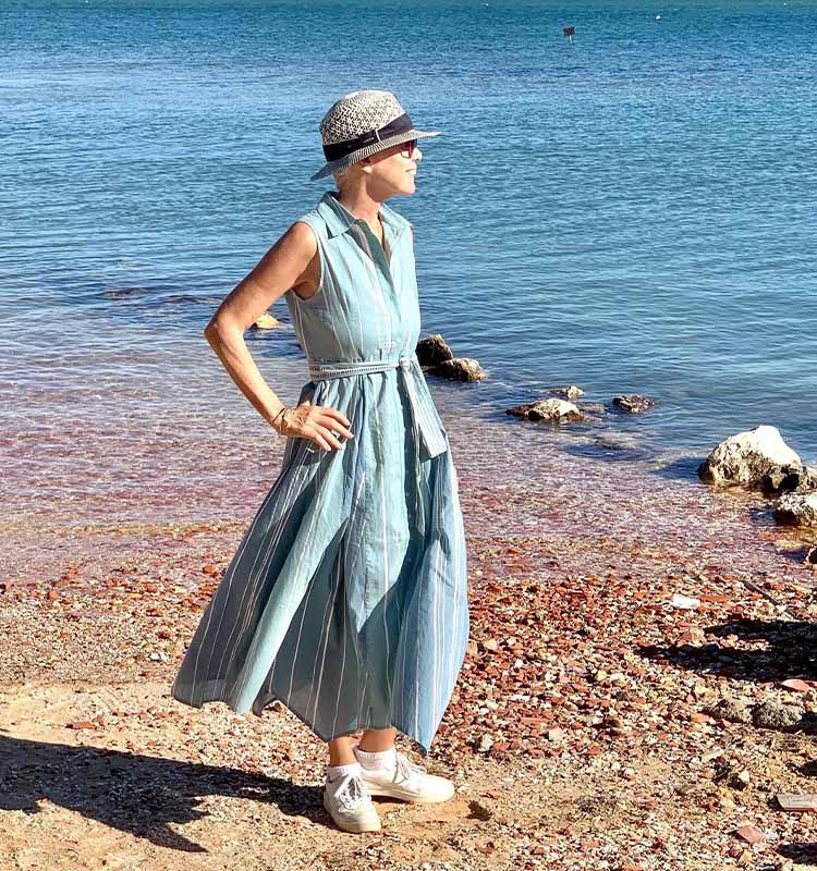 Sylvia wears sneakers with her summer dress | 40plusstyle.com