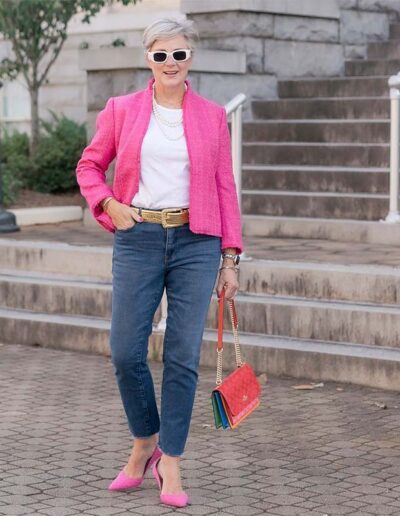 Beth wears pink blazer and pumps with jeans and a white top | 40plusstyle.com