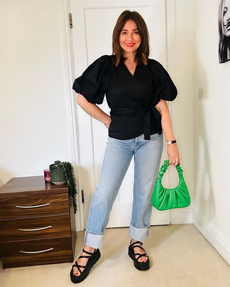 Nikki wears a wrap top and jeans | 40plusstyle.com