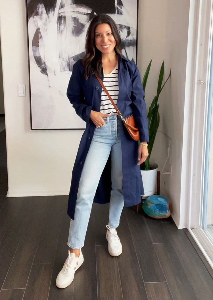 Adaline wearing trench coat, jeans and sneakers | 40plusstyle.com