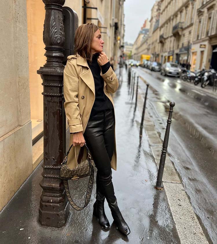 Sylvia wears leather pants and a trench coat | 40plusstyle.com